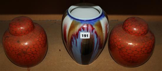 Chinese flambe jar and a pair of orange ground jars & covers